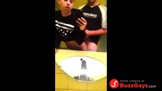 Two twinks fucking in public toilet after practice