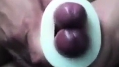 Buddies using a cock sleeve together with nice cumshots