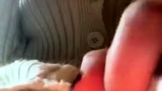 Busty curly brunette with big boobs fucks on couch