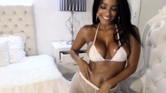 Busty curly brunette with big boobs fucks on couch