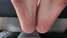 Cute teen girl enjoys foot fetish