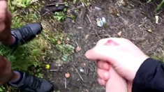 2 guys wanking down the woods